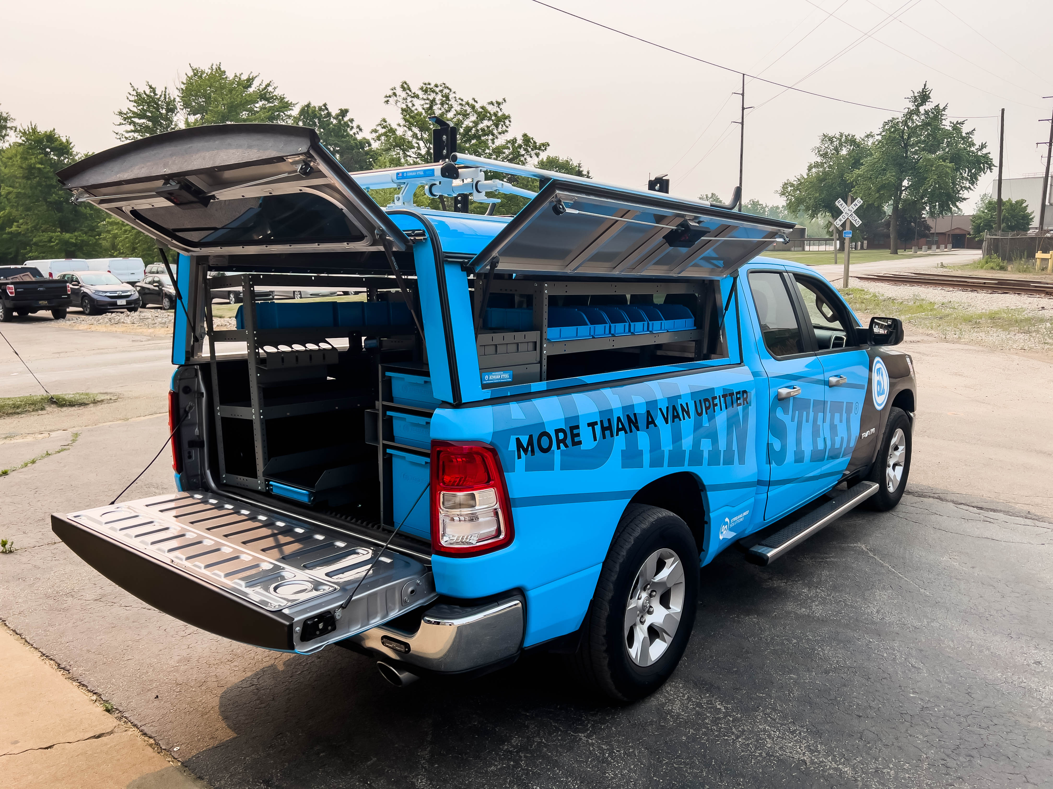 exterior view of the right side of a pickup fully upfitted with an Adrian Steel Security Contractor storage package