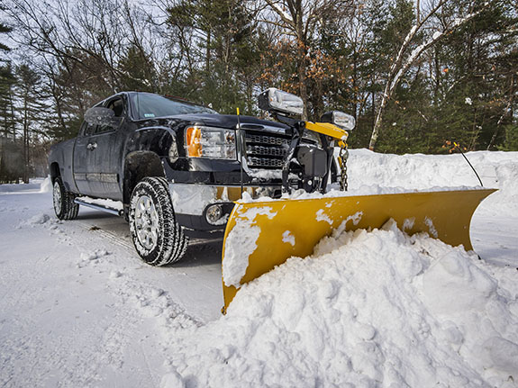 pickup truck plowing snow | Transitioning your landscaping business in the off season |Adrian Steel 