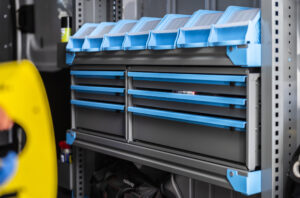 van slide out trays in an upfitted van