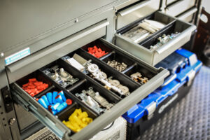 Parts drawer with electrical supplies.