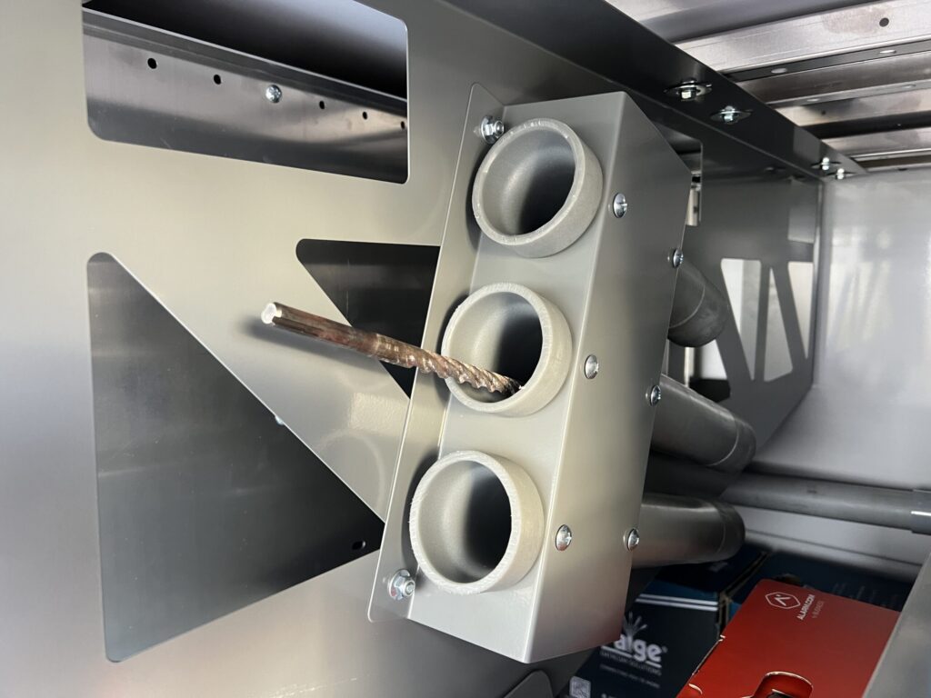 Close-up of Adrian's glow rod/conduit carrier solution